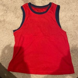 Walmart tank has a slight crop to is size is L 11-13